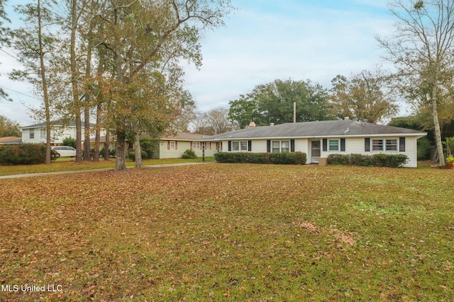 ranch-style house with a front yard