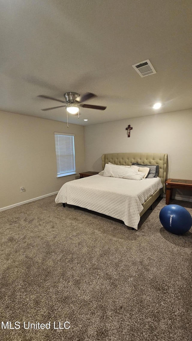 bedroom with baseboards, visible vents, a ceiling fan, and carpet