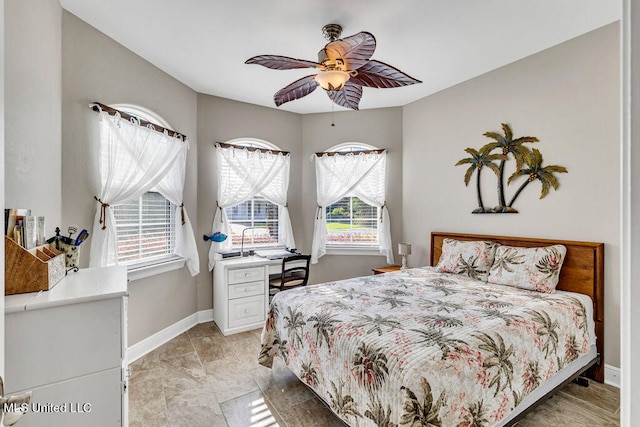 bedroom featuring ceiling fan