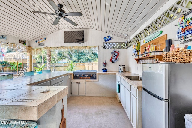 view of patio featuring area for grilling, ceiling fan, and grilling area