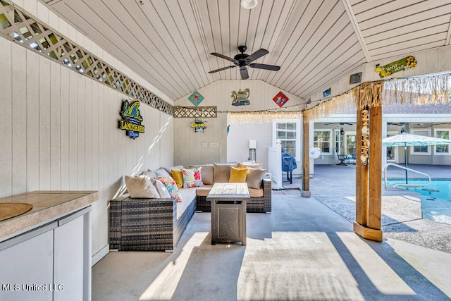 view of patio / terrace featuring ceiling fan