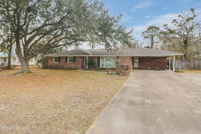 ranch-style home with a carport