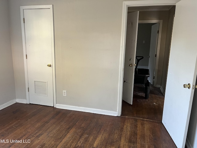 2115 Powers Ave, Jackson, MS 39213 - unfurnished bedroom featuring hardwood / wood-style floors