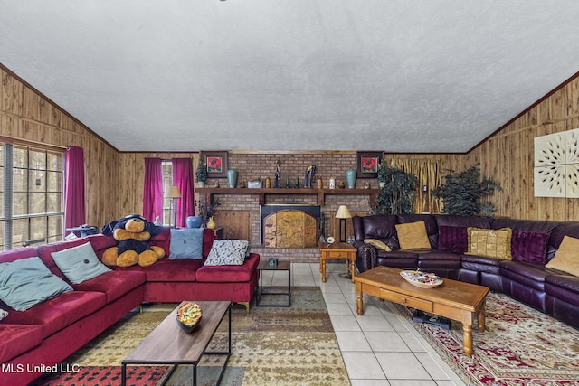 tiled living room with a wood stove, wood walls, vaulted ceiling, and a textured ceiling