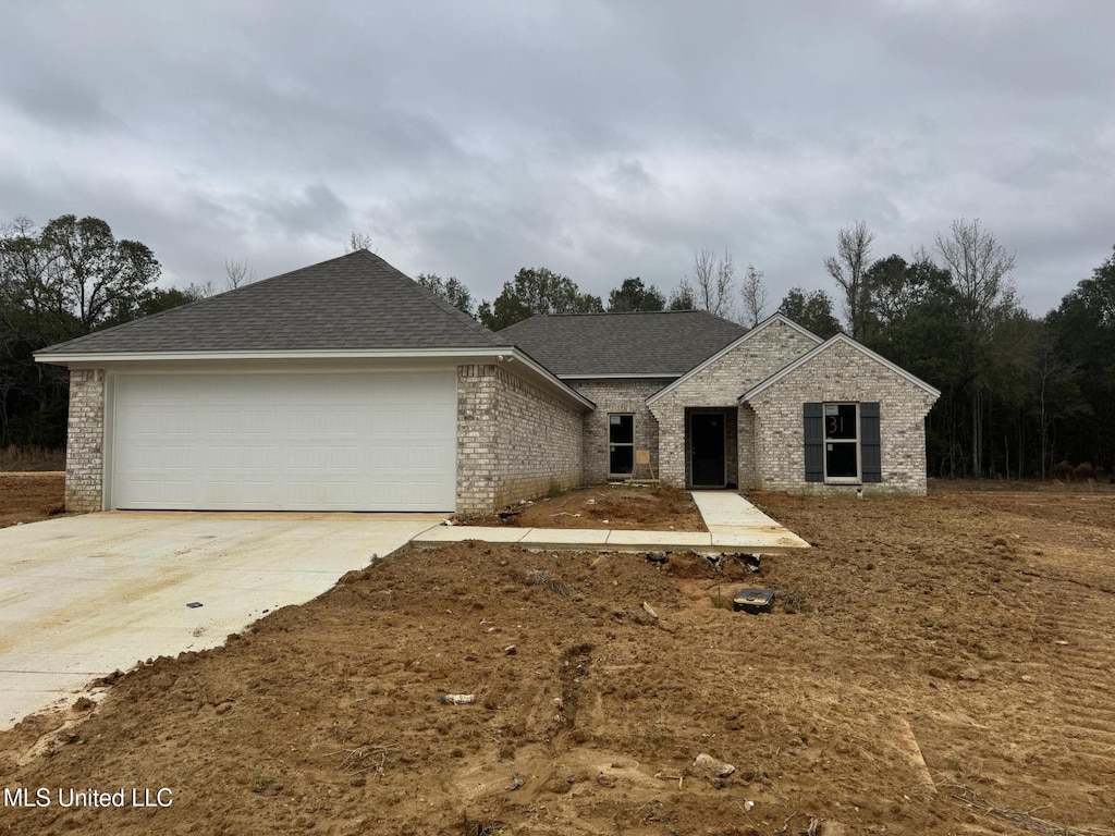 view of front of home featuring a garage