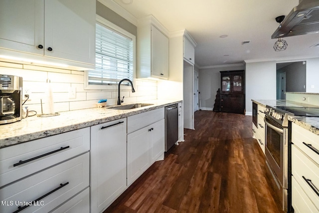 kitchen featuring a sink, stainless steel appliances, decorative backsplash, dark wood-type flooring, and light stone countertops