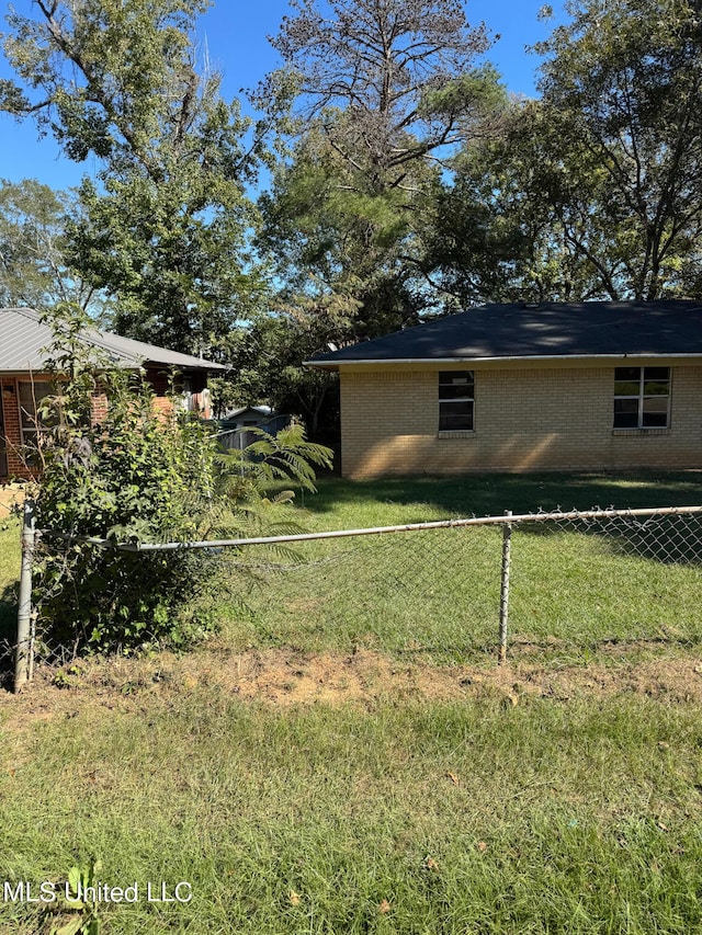 306 Hillcrest St, Carthage, MS 39051 - view of side of property featuring brick siding