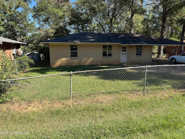 306 Hillcrest St, Carthage, MS 39051 - view of front facade with brick siding and a carport