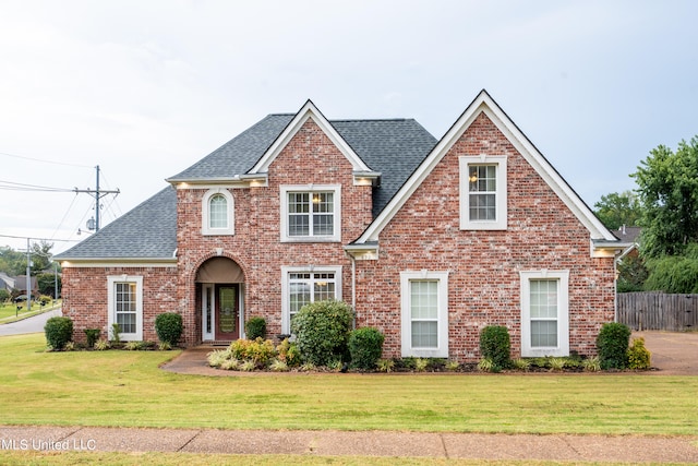 view of front of home with a front yard