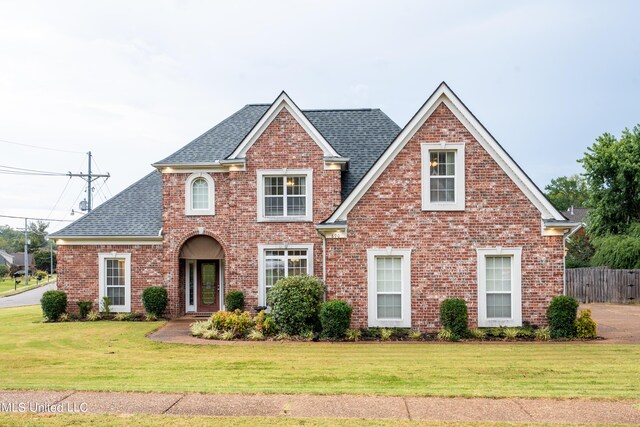 890 Lindsey Cv, Hernando, MS 38632 - view of front facade featuring brick siding and roof with shingles