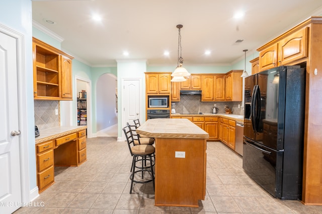 kitchen featuring backsplash, black appliances, a center island, decorative light fixtures, and light tile patterned floors