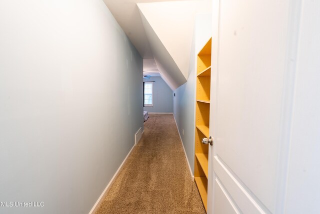 890 Lindsey Cv, Hernando, MS 38632 - corridor with carpet, vaulted ceiling, and baseboards