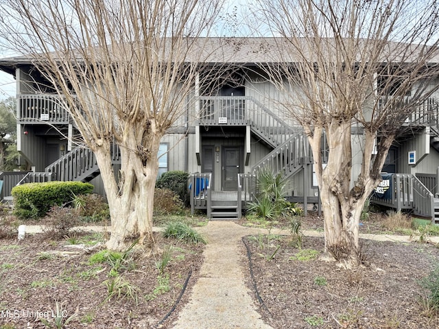 view of property with stairs