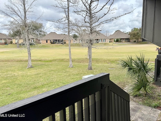 view of yard featuring a residential view