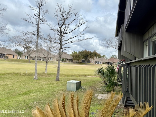 view of yard with a residential view