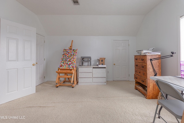 interior space with light colored carpet and lofted ceiling