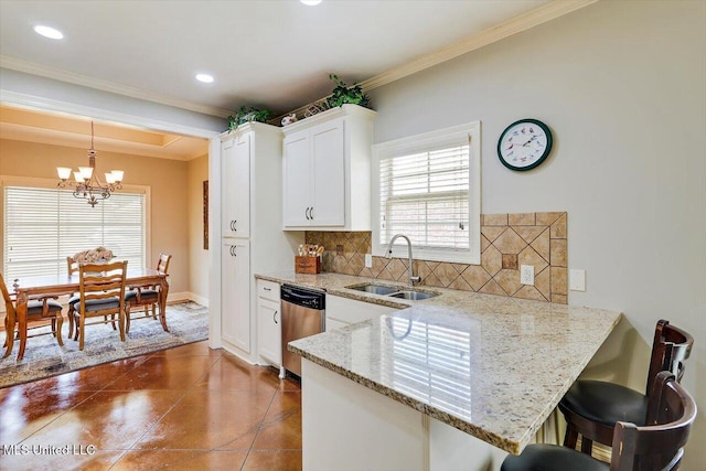 648 Westhill Rd, Brandon, MS 39042 - kitchen with dishwasher, a sink, a chandelier, tasteful backsplash, and ornamental molding