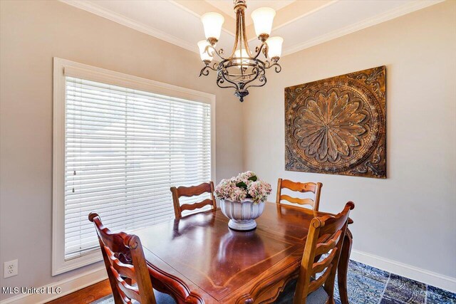 648 Westhill Rd, Brandon, MS 39042 - dining room with a chandelier, baseboards, and ornamental molding