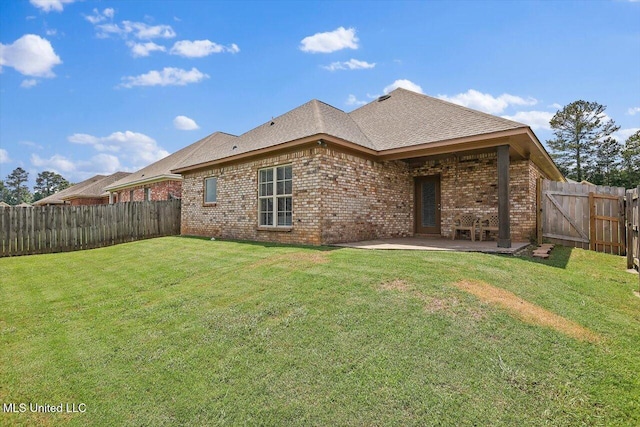 648 Westhill Rd, Brandon, MS 39042 - back of house with brick siding, a patio, and roof with shingles