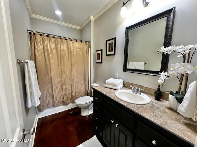 648 Westhill Rd, Brandon, MS 39042 - full bathroom with vanity, ornamental molding, toilet, and shower / tub combo with curtain