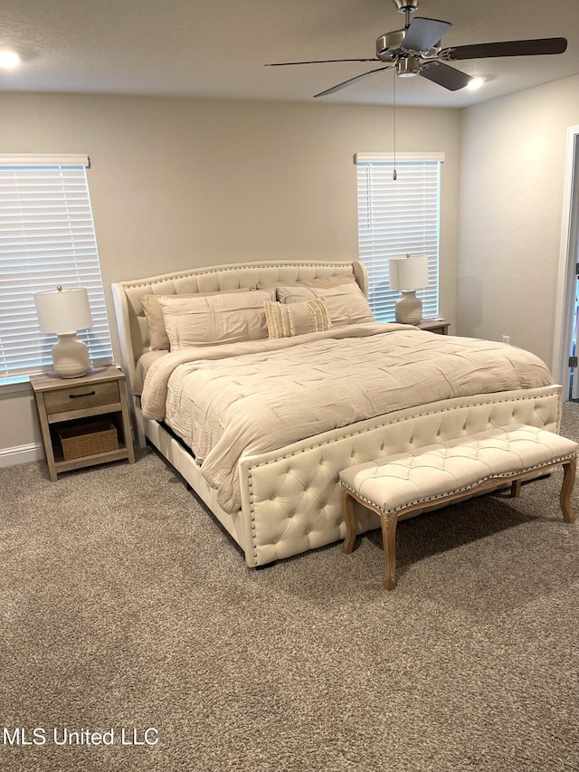 5438 Leeds Ln, Biloxi, MS 39532 - carpeted bedroom with baseboards and ceiling fan