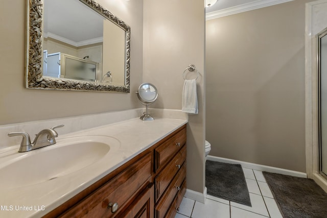 bathroom featuring vanity, tile patterned floors, a stall shower, and ornamental molding