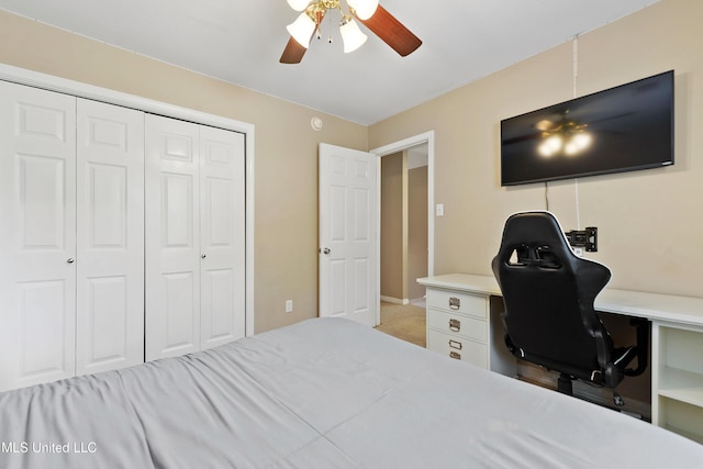 bedroom featuring a closet, carpet, and ceiling fan