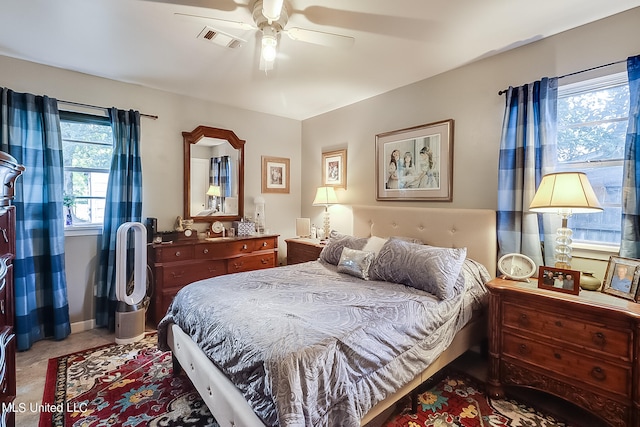 carpeted bedroom with ceiling fan