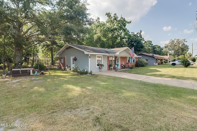 ranch-style house with a front lawn