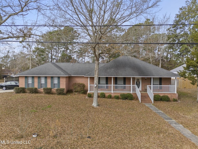 single story home with covered porch