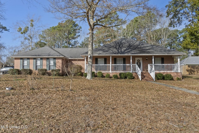 ranch-style home featuring a porch