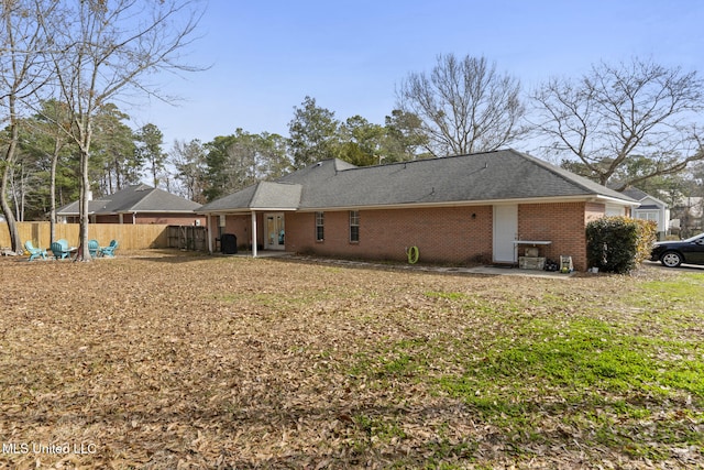 back of house with a patio area