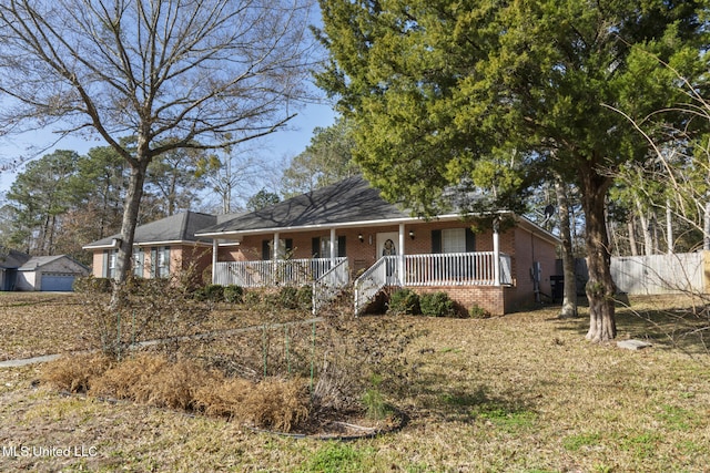 ranch-style home featuring covered porch