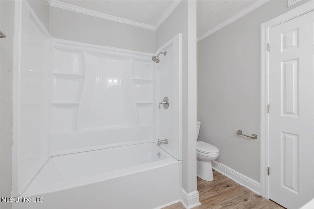 250 1st St, Webb, MS 38966 - full bathroom featuring wood finished floors, toilet, ornamental molding, baseboards, and washtub / shower combination