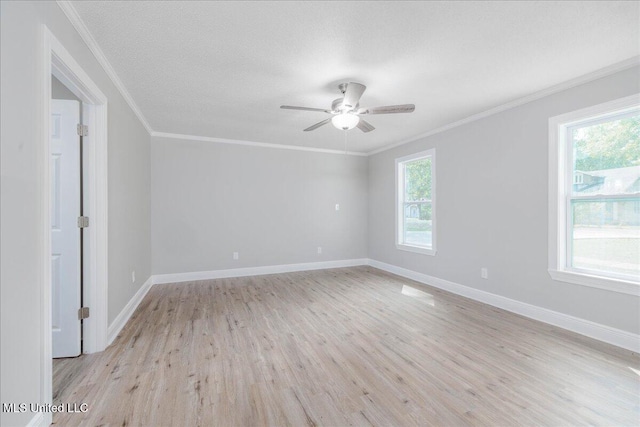 250 1st St, Webb, MS 38966 - unfurnished room featuring light wood-style flooring, a ceiling fan, baseboards, and ornamental molding