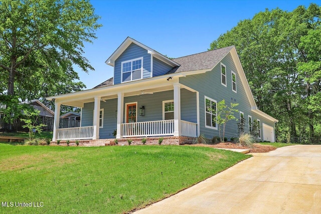 view of front of property with a front yard and a porch