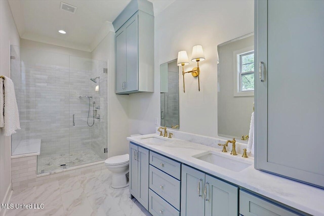 bathroom with vanity, toilet, and an enclosed shower