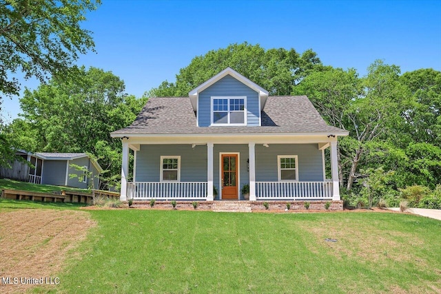 view of front of home featuring a front lawn and a porch