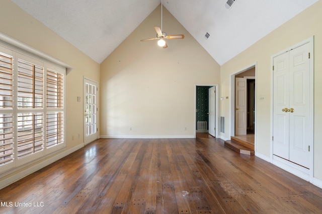 interior space featuring ceiling fan, high vaulted ceiling, and dark hardwood / wood-style floors