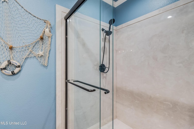 bathroom featuring walk in shower