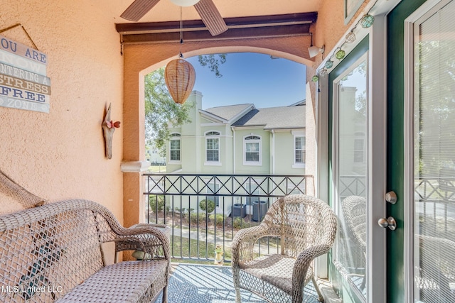 balcony featuring ceiling fan