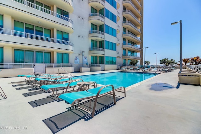 community pool featuring a patio