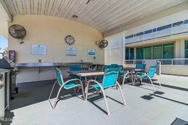 view of patio with outdoor dining area