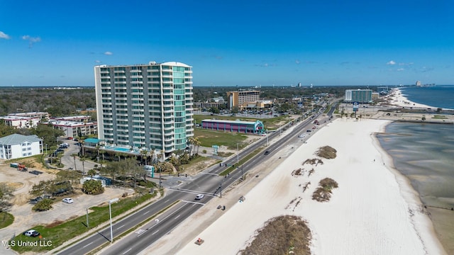 bird's eye view featuring a view of city, a water view, and a view of the beach