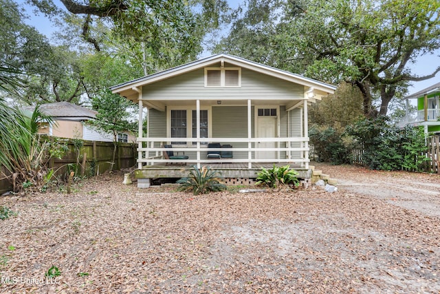 bungalow-style home with covered porch