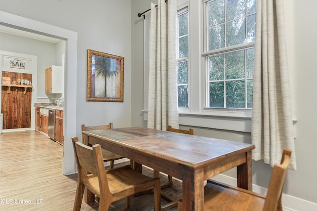 dining space featuring light hardwood / wood-style flooring