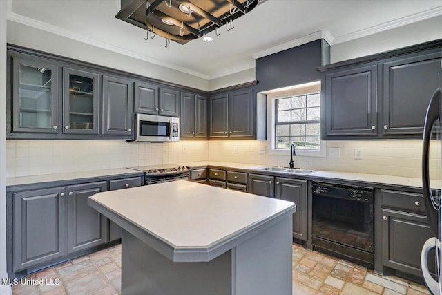 kitchen featuring ornamental molding, a sink, backsplash, and black appliances