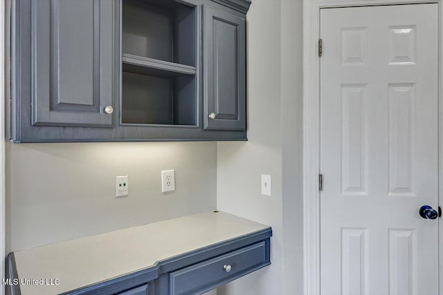 kitchen featuring light countertops and gray cabinets