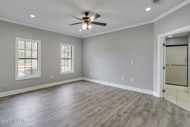 unfurnished bedroom with crown molding, recessed lighting, visible vents, wood finished floors, and baseboards