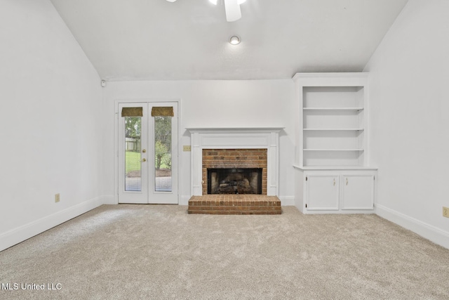1035 N Azalea Dr, Madison, MS 39110 - unfurnished living room with ceiling fan, carpet, a fireplace, baseboards, and lofted ceiling